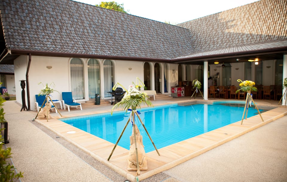 The main house is designed to wrap around the atrium and swimming pool.