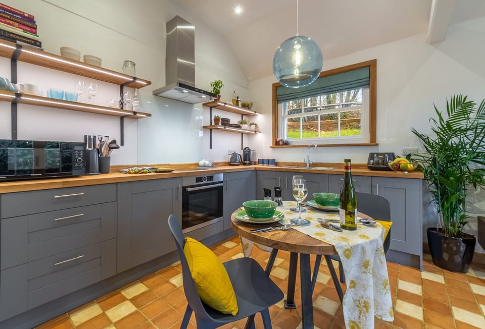 Ground floor: Open-plan kitchen with seating for two (please note, there is no coffee machine)
