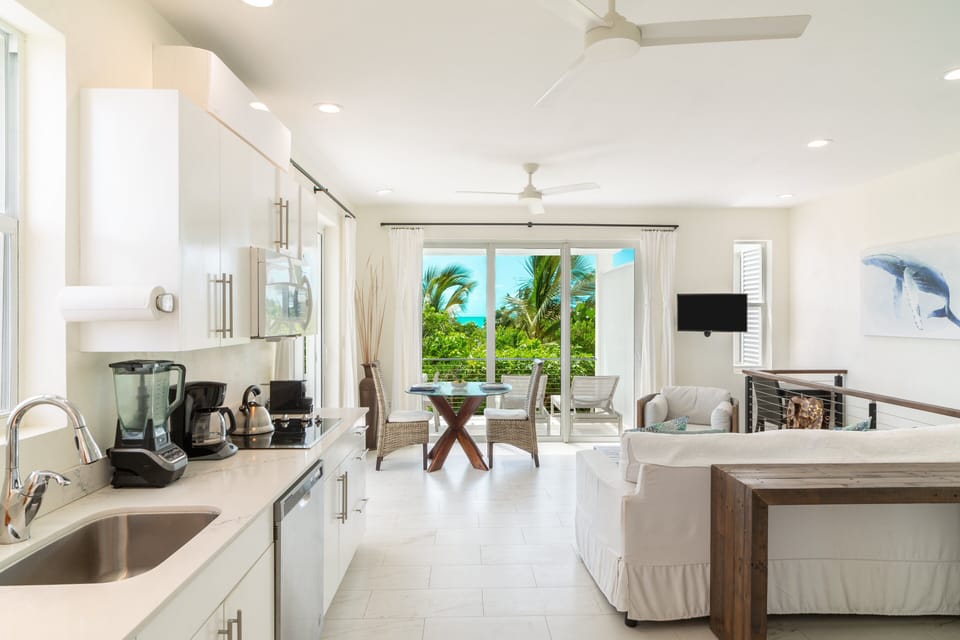 This exceptional property invites you to indulge in a luxurious coastal escape that combines the allure of breathtaking ocean panoramas with the warmth of a fully-equipped kitchen, ensuring an unforgettable retreat like no other.