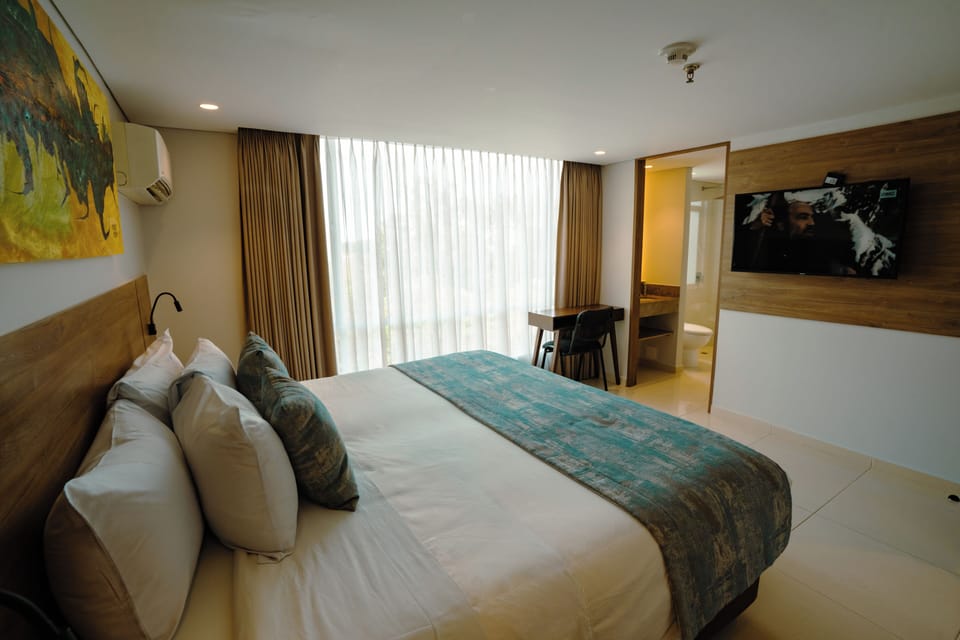 Superior Room, 1 King Bed | Down comforters, in-room safe, blackout drapes, free WiFi