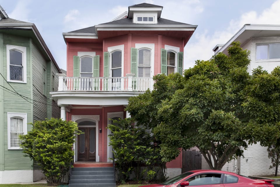 Welcome to the Pershing Suite! Take the Victorian side hall to your NOLA getaway