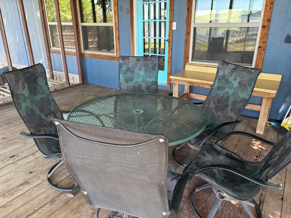 The patio is a great place to enjoy the sunset in a screened-in porch.