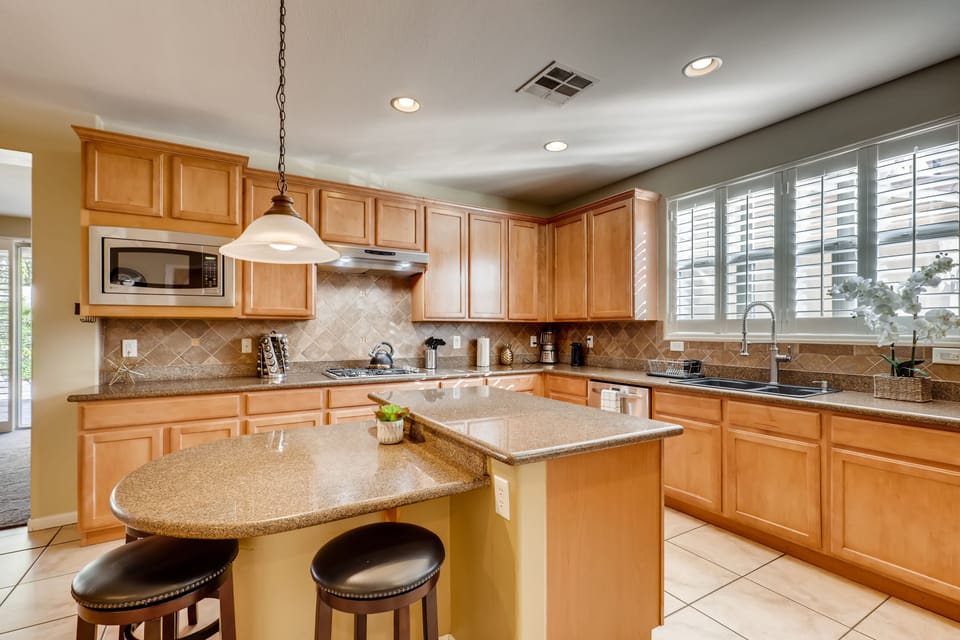 Kitchen with seating. 