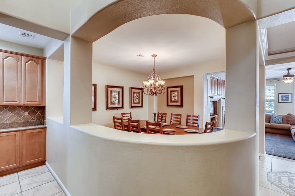 The dinning room from the entry. Mini bar to the left & living room to the right