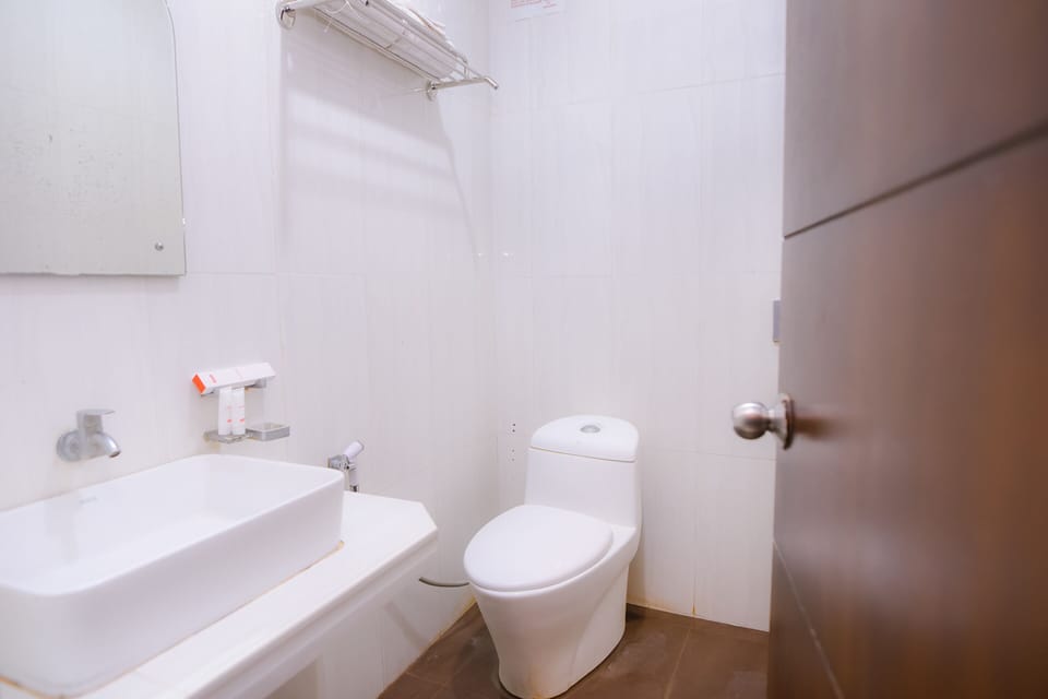 Shower, free toiletries, slippers, towels