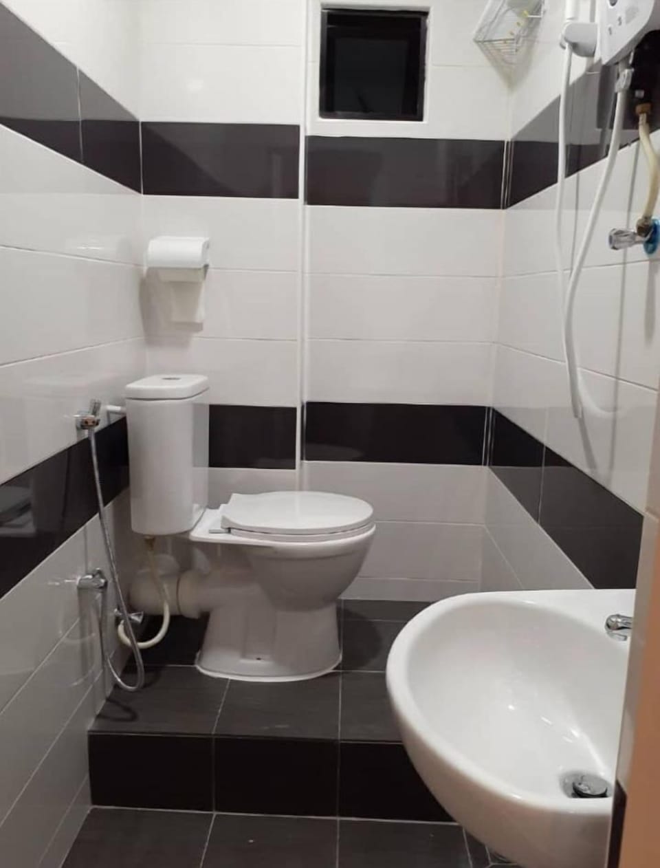 Shower, towels, soap, toilet paper