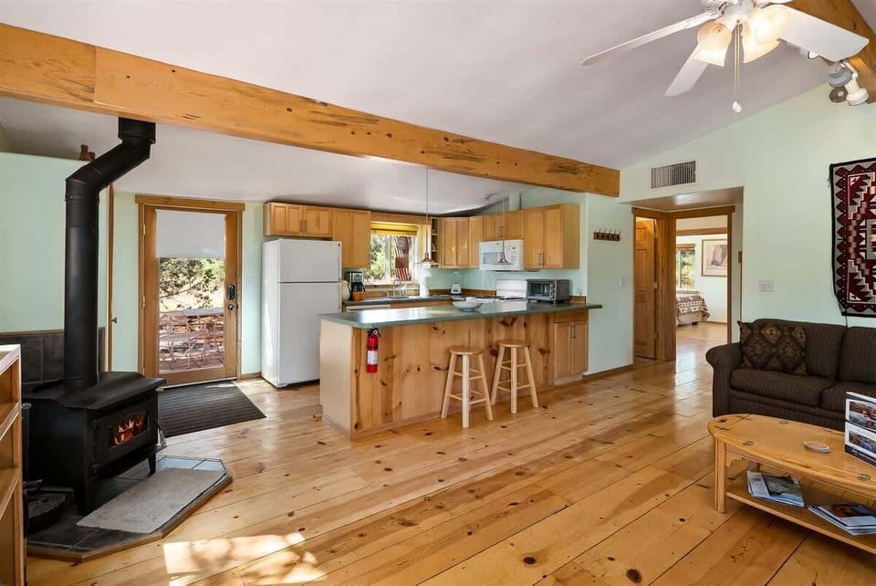 A wood-burning stove gives additional heat in the cooler months