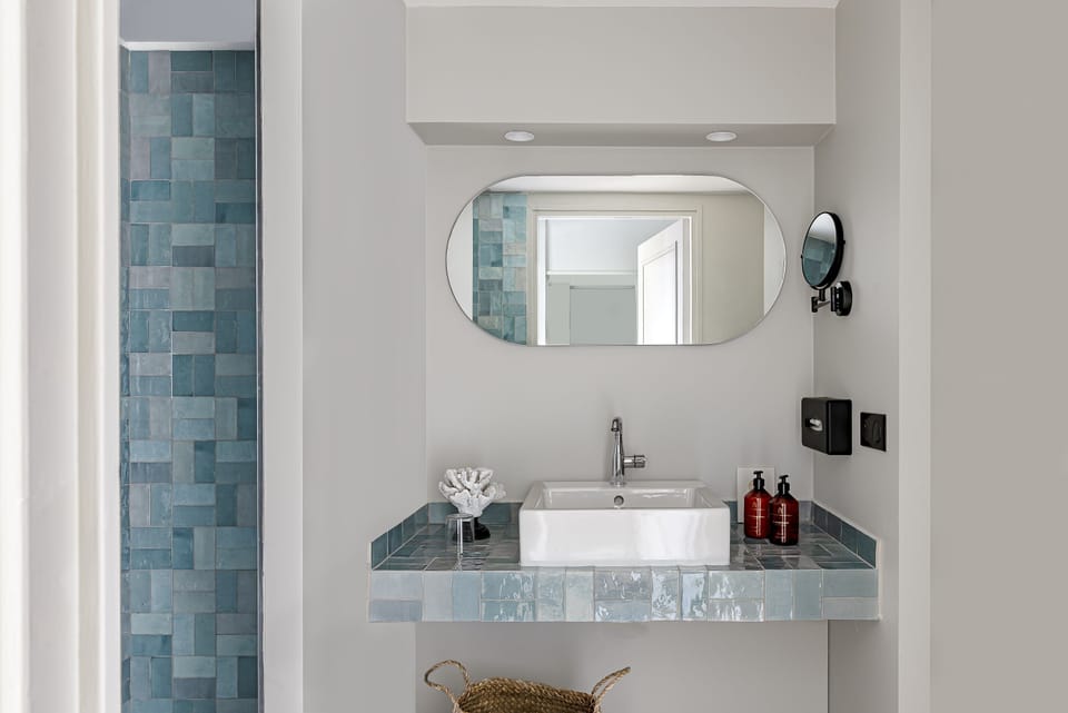 Deluxe Room | Bathroom | Designer toiletries, hair dryer, bathrobes, slippers