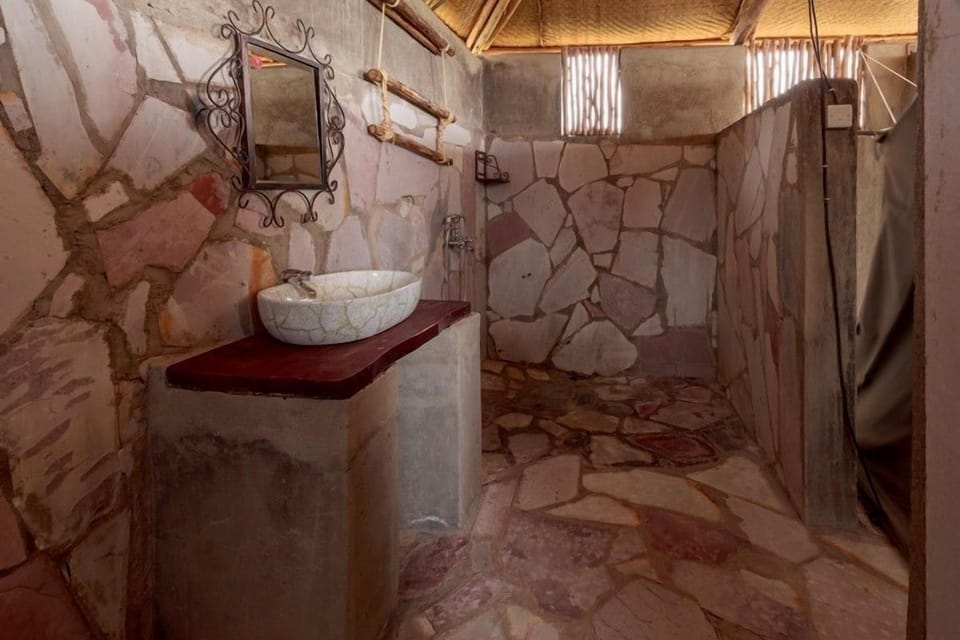 Shower, rainfall showerhead, slippers, towels