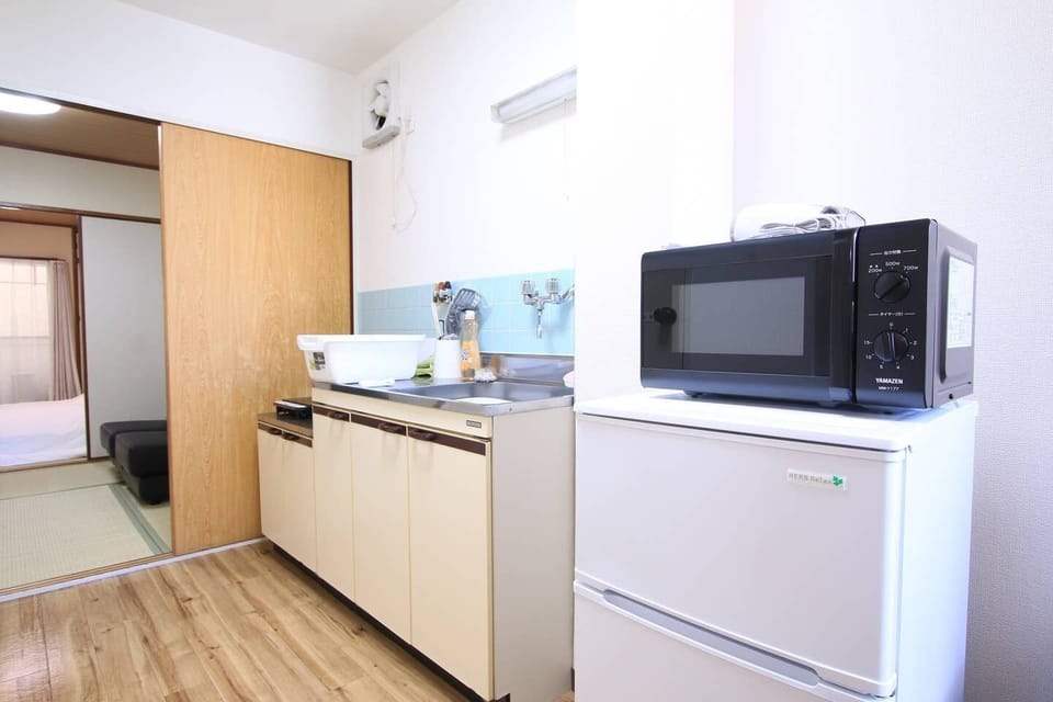 Apartment, 1 Bedroom (I201) | Private kitchen | Fridge, microwave, stovetop, electric kettle