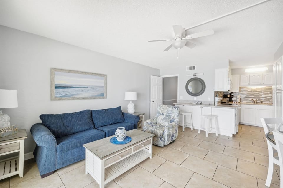 Condo, 1 King Bed (The Summit 1017) | Living area | Flat-screen TV