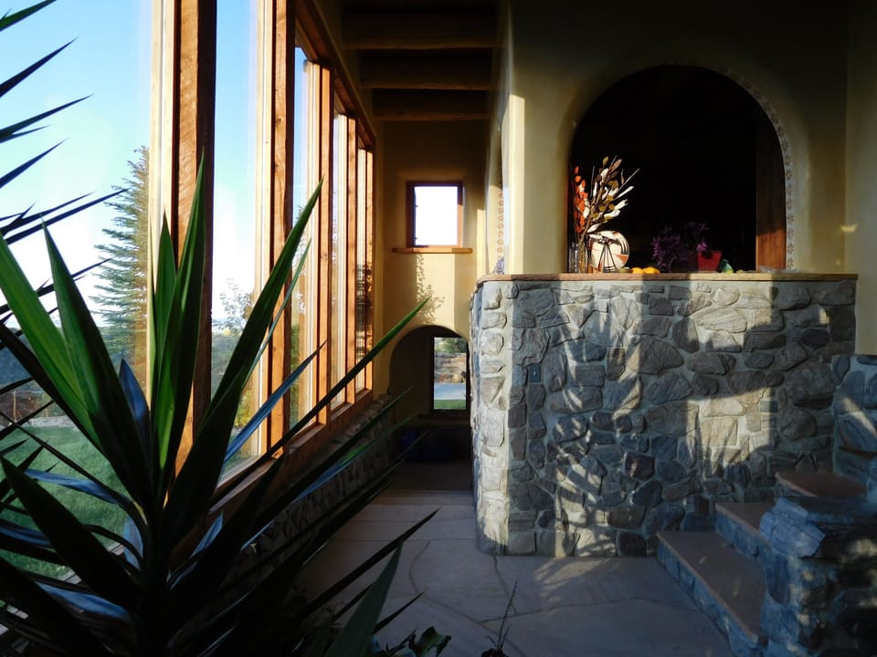 Greenroom stairs to back patio and view up into kitchen.