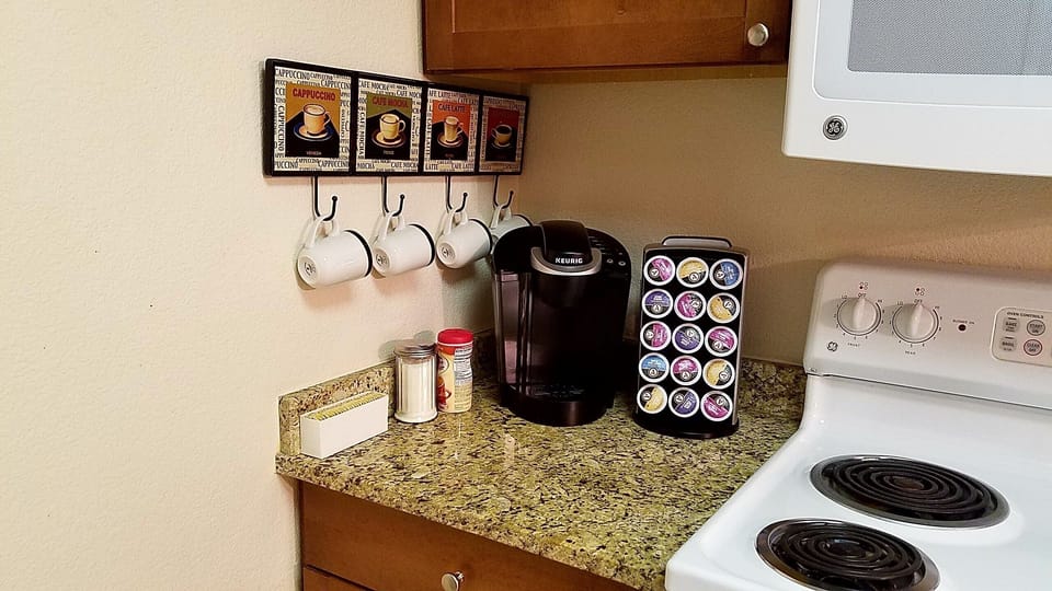 Keurig machine with complimentary coffee and tea. 