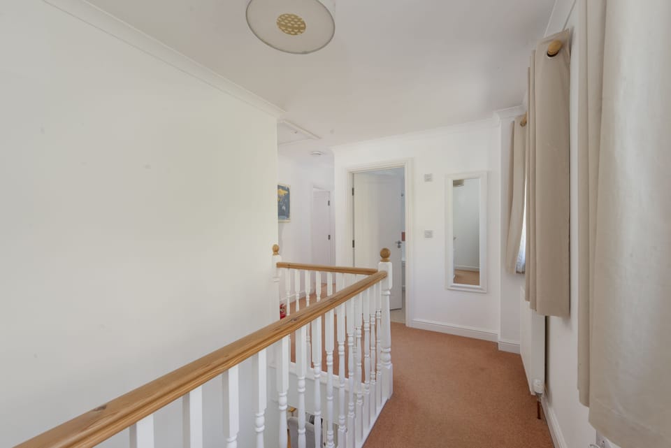 Waterfront House, Malpas. First floor: Hallway leading to family bathroom