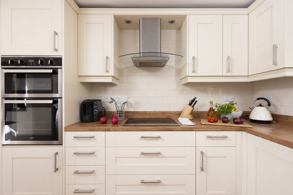 Waterfront House, Malpas. Ground floor: Kitchen with oven and hob, fridge/freezer and dishwasher.
