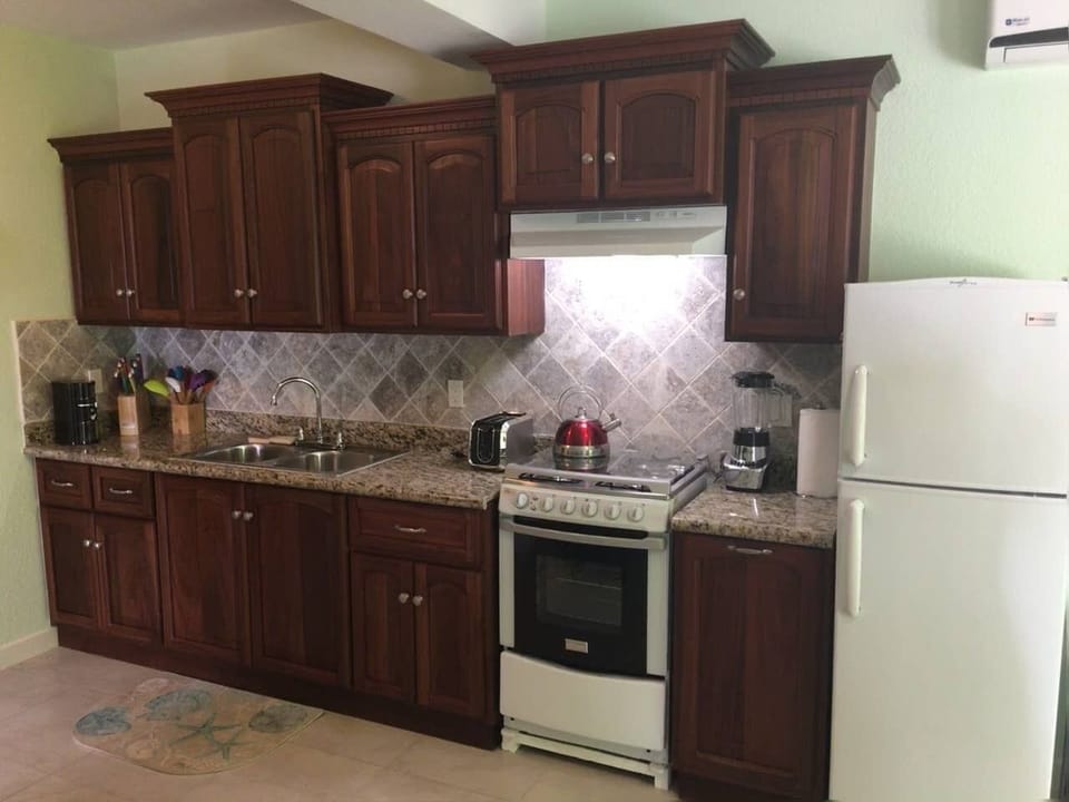 Separate Downstairs Kitchen.