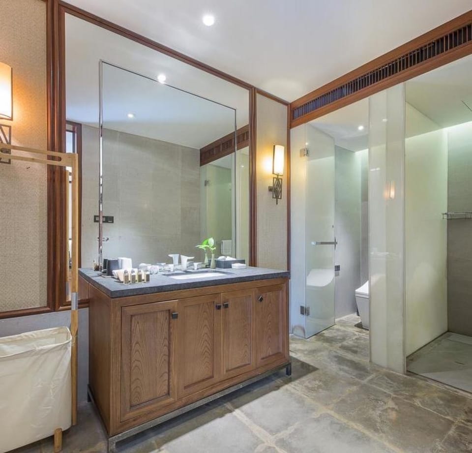 Luxury Double Room | Bathroom | Separate tub and shower, rainfall showerhead, designer toiletries