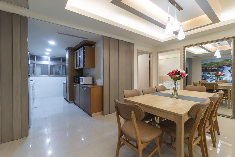Spacious Dining Area: 
• Seating for 8 
• Open Space w/ Living Room