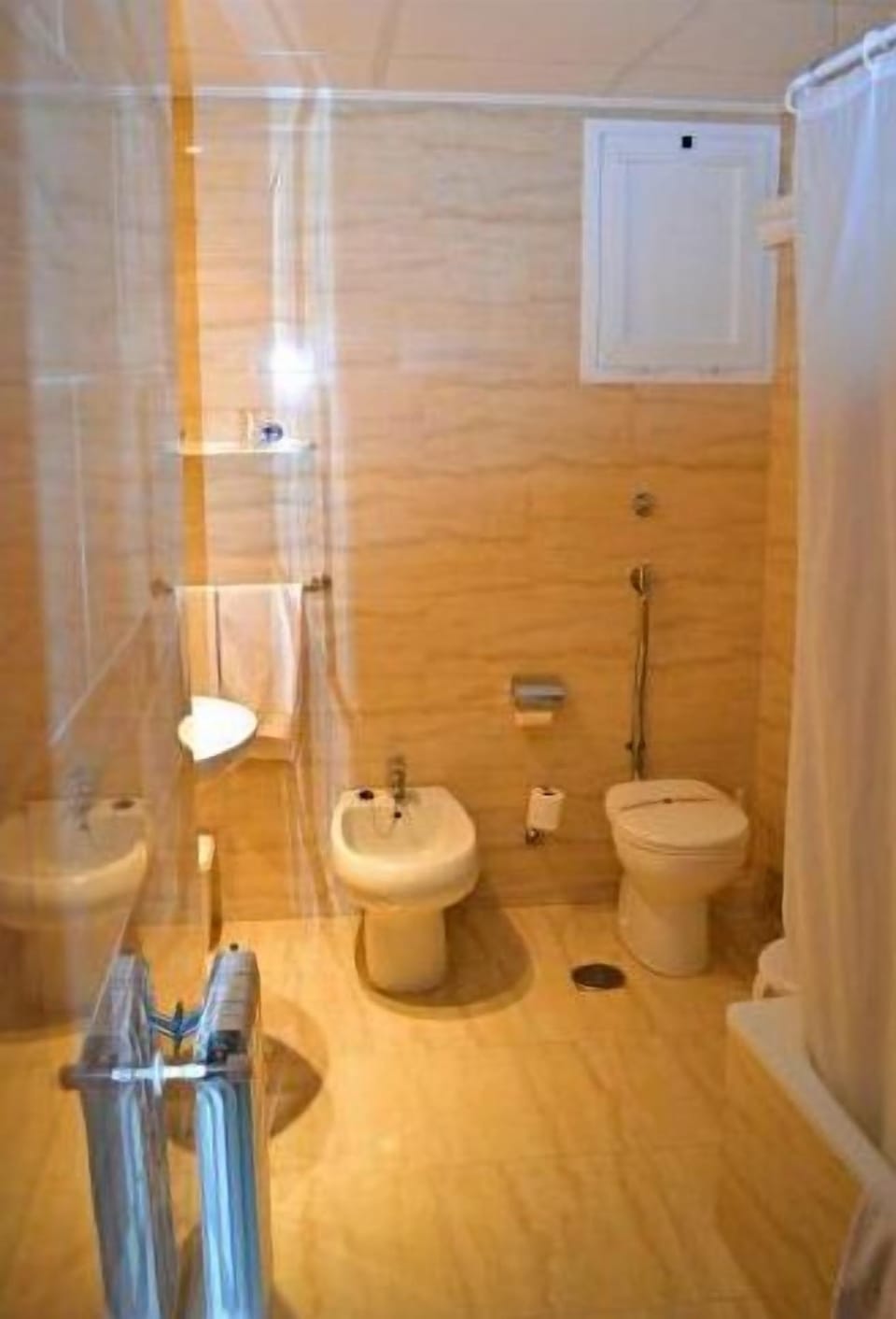 Combined shower/tub, deep soaking tub, hair dryer (on request), towels