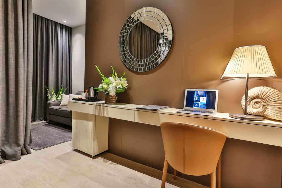 Superior Double Room | Minibar, in-room safe, desk, blackout drapes
