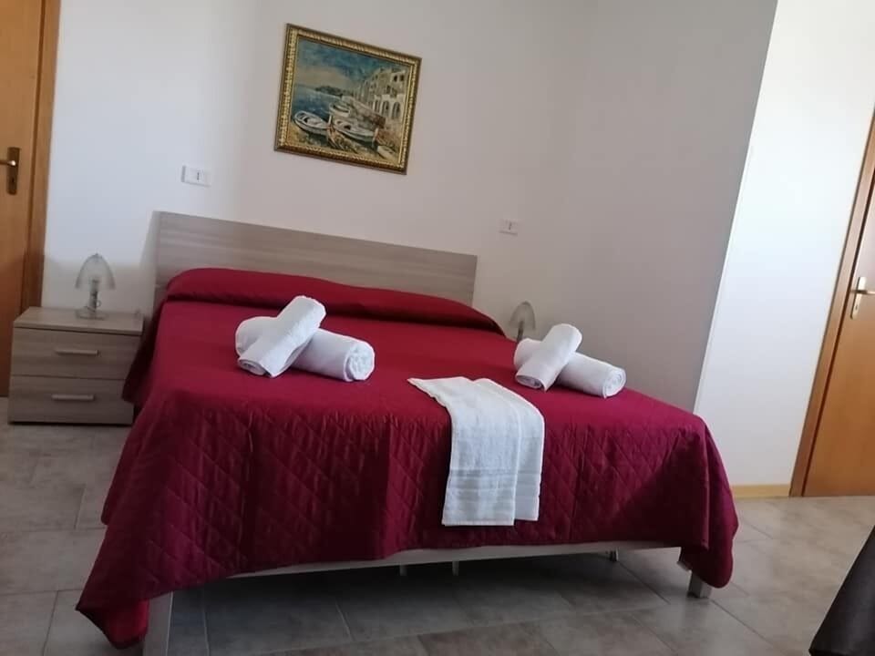 Double Room | Minibar, desk, iron/ironing board, cribs/infant beds