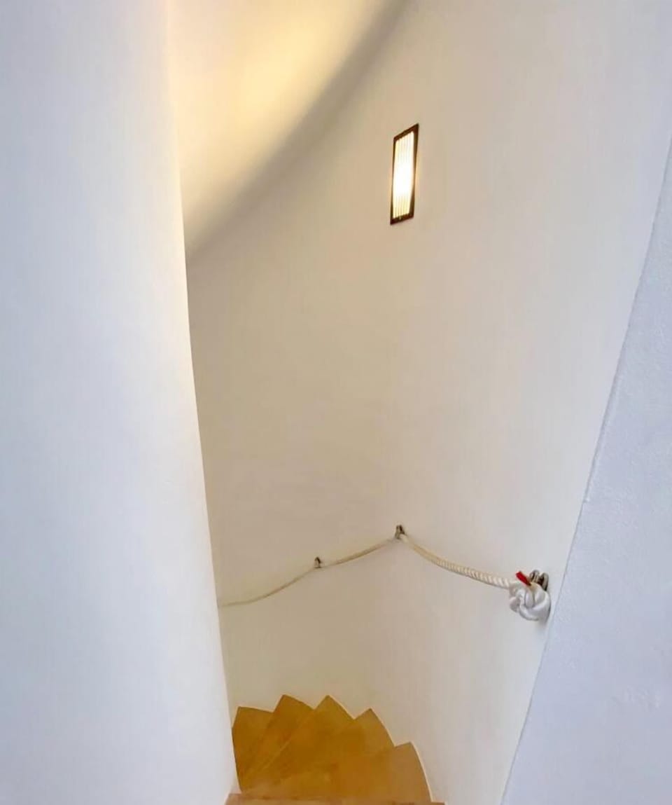 Stairs to access the private master bedroom.