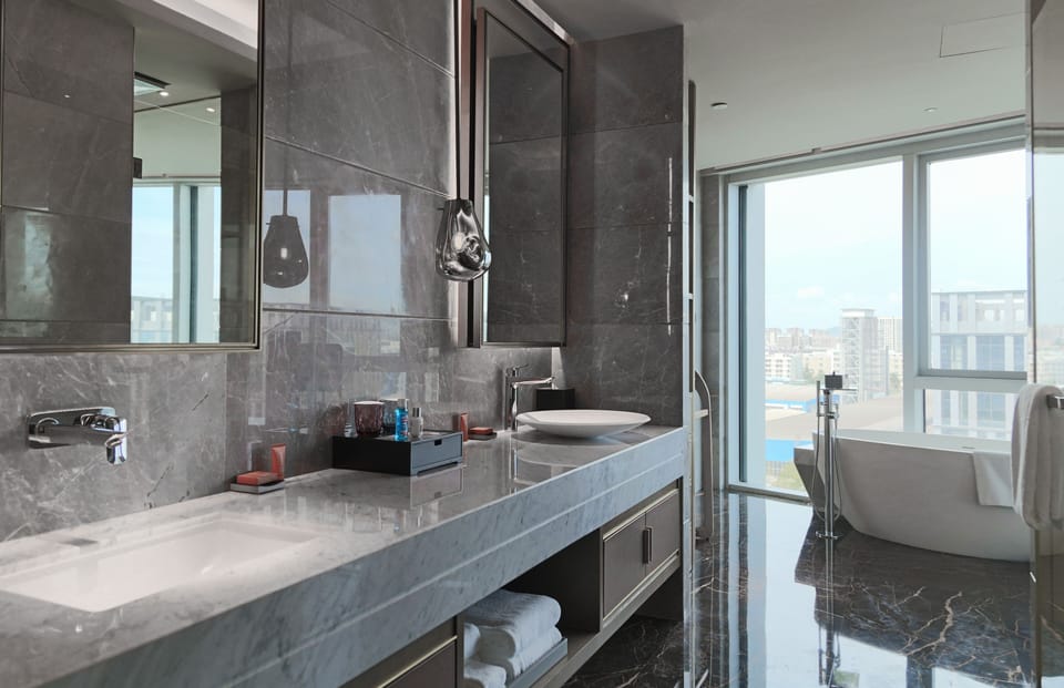 Royal Suite, 1 Queen Bed | Bathroom | Rainfall showerhead, designer toiletries, hair dryer, bathrobes