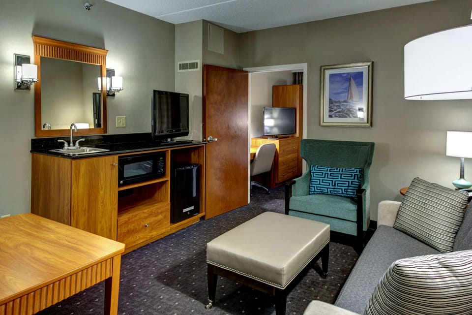 Premium bedding, down comforters, pillowtop beds, in-room safe