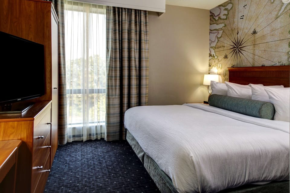 Premium bedding, down comforters, pillowtop beds, in-room safe
