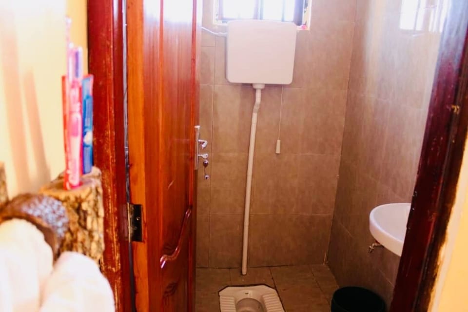Rainfall showerhead, bathrobes, towels, soap