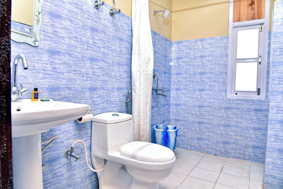 Shower, slippers, towels, soap