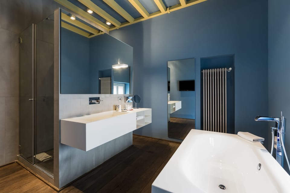 Junior Suite | Bathroom | Designer toiletries, hair dryer, bathrobes, slippers