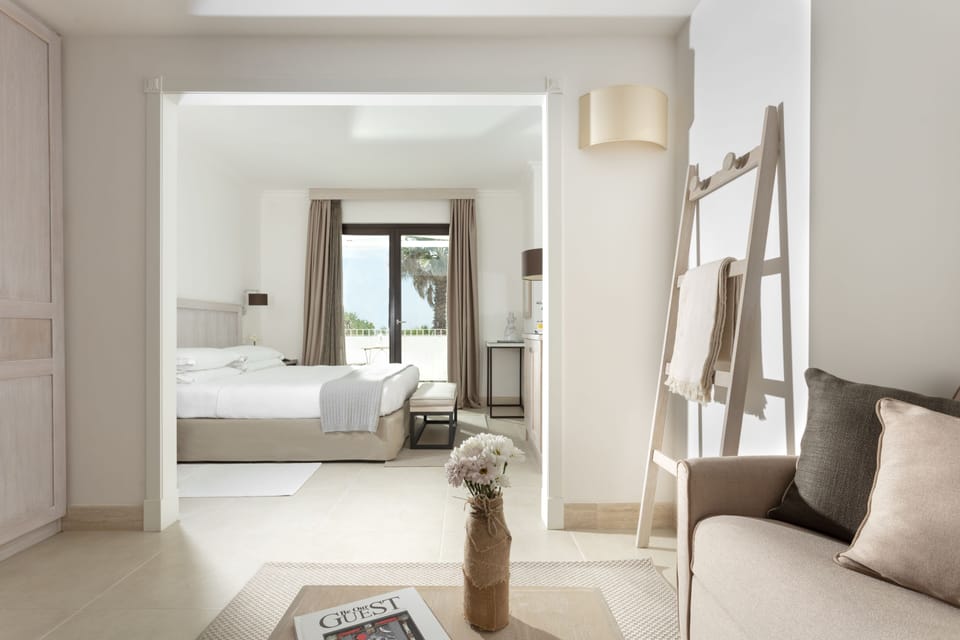 Junior Double Room, 1 Bedroom, Balcony, Partial Sea View | 1 bedroom, hypo-allergenic bedding, in-room safe, desk