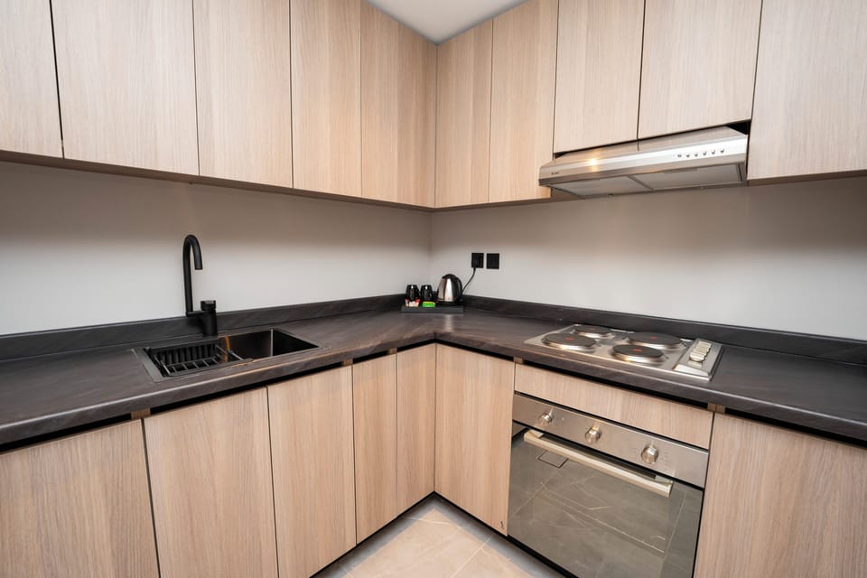 Family Apartment | Private kitchen | Cookware/dishes/utensils, paper towels