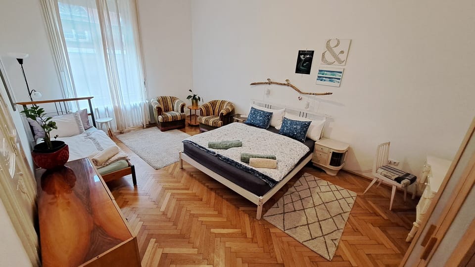 Deluxe Triple Room, Private Bathroom | Individually decorated, individually furnished, blackout drapes