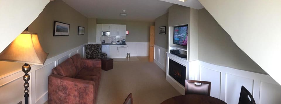 28-inch TV with cable channels, DVD player, iPod dock