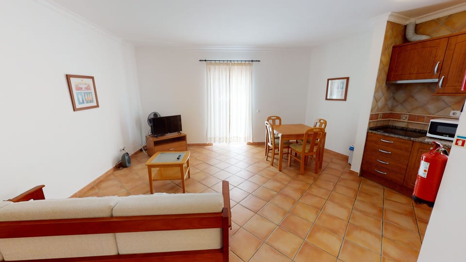 Apartment, 2 Bedrooms | Living room | TV