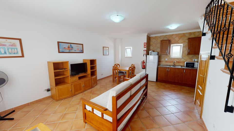 Apartment, 1 Bedroom | Living room | TV