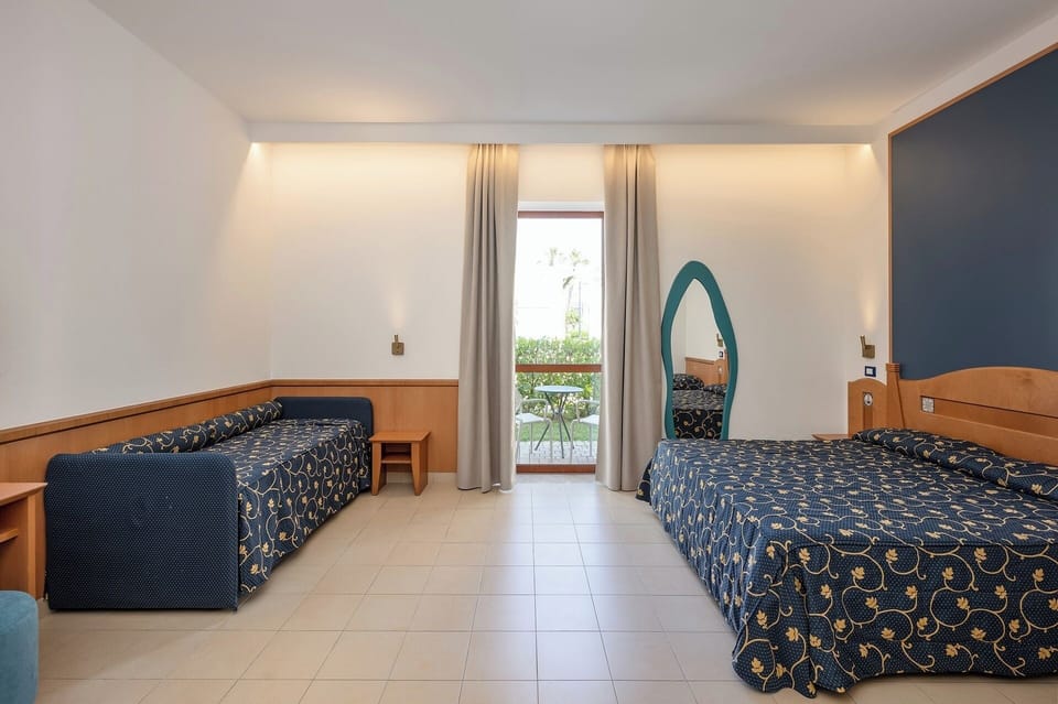 Standard Room, Garden View, beach Facilities Excluded | Minibar, in-room safe, cribs (surcharge), bed sheets