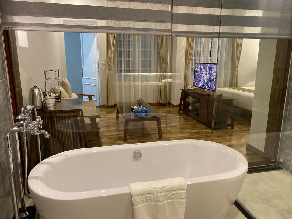Premium Double Room | Bathroom | Hair dryer, slippers, towels