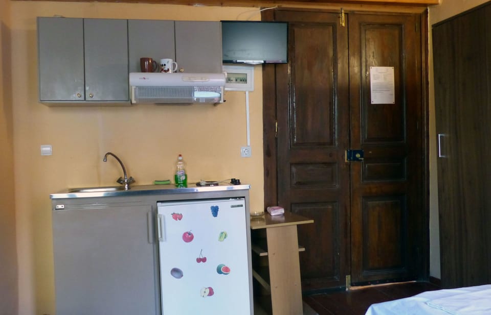 Standard Triple Room | Private kitchen | Fridge, electric kettle