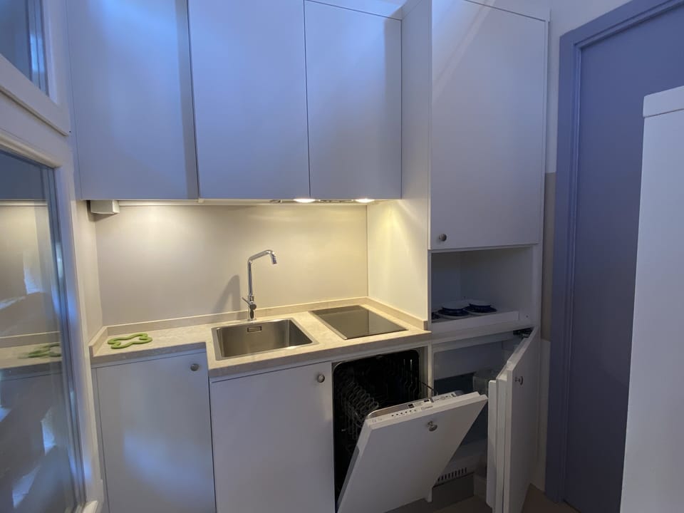 Kitchenette offers all the comforts from  dishwasher to microwave.
