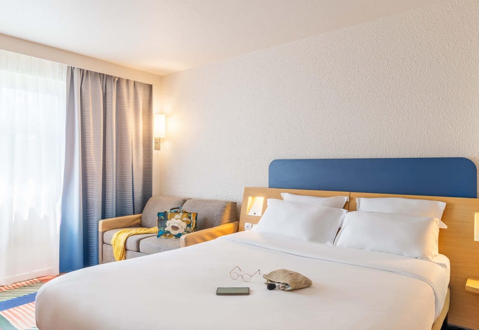Premium bedding, memory foam beds, in-room safe, desk