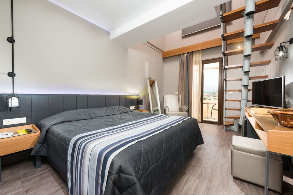 Family Maisonette | Minibar, in-room safe, desk, laptop workspace