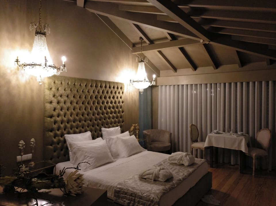 Minibar, blackout drapes, iron/ironing board, bed sheets