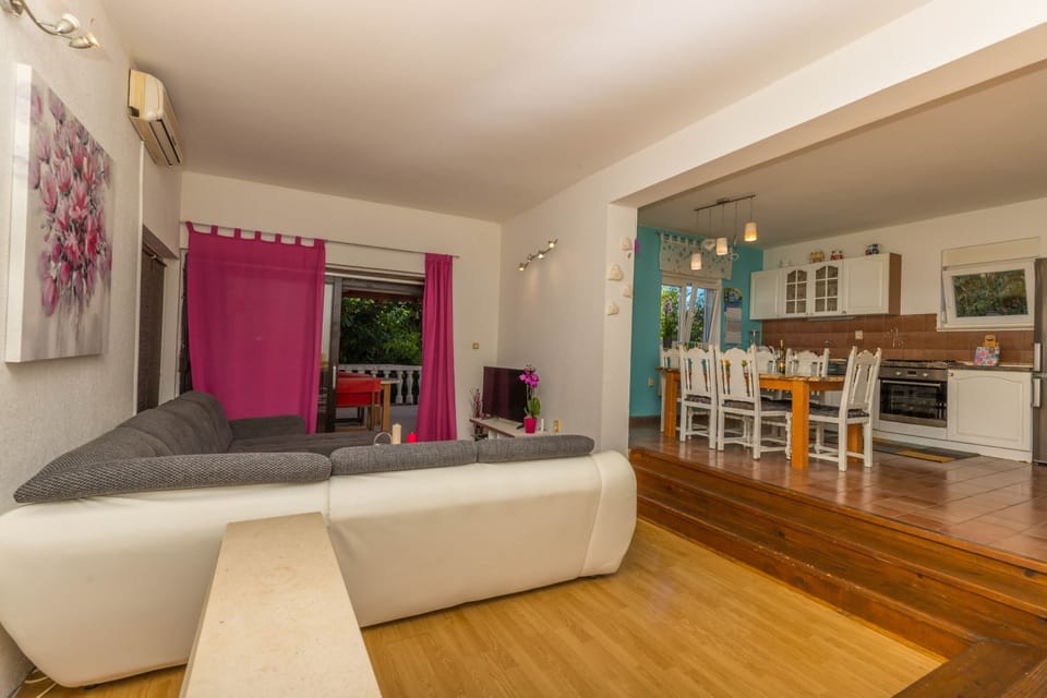 Apartment, 2 Bedrooms | Living area | Flat-screen TV