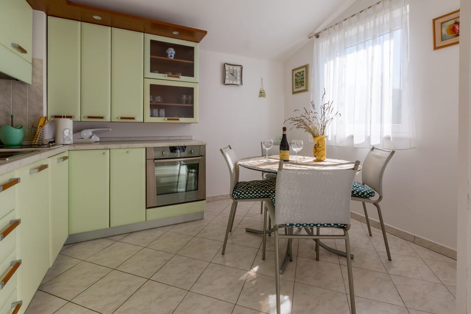 Apartment, 1 Bedroom, Sea View | Private kitchen | Fridge, oven, stovetop, coffee/tea maker