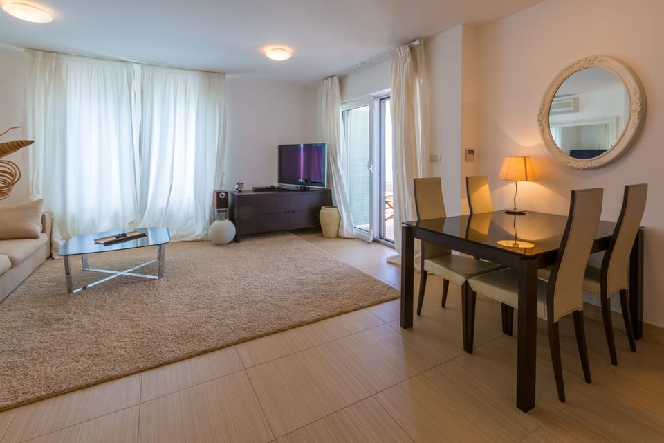 Apartment, 2 Bedrooms, Sea View | Living area | Flat-screen TV