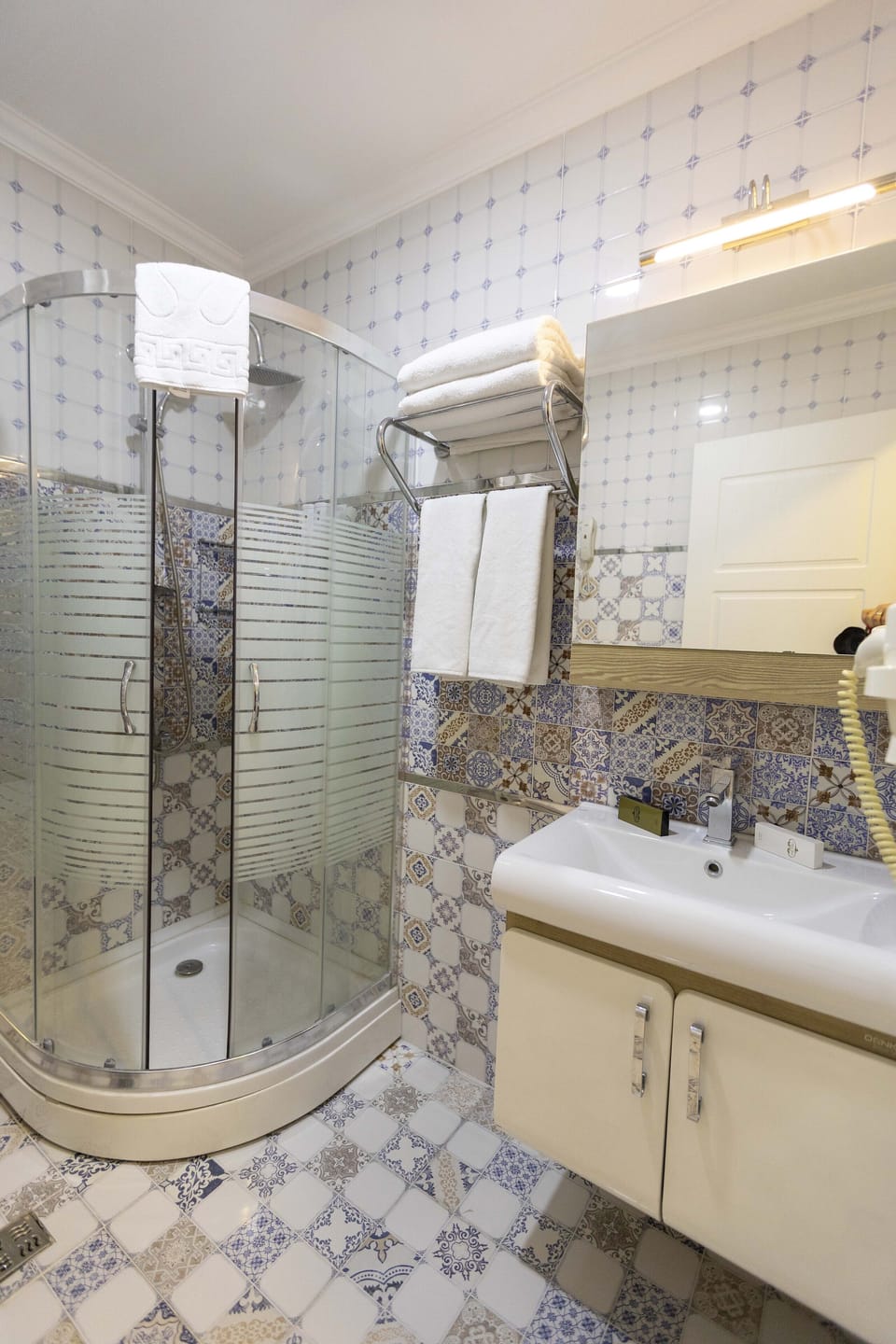 Shower, free toiletries, hair dryer, slippers