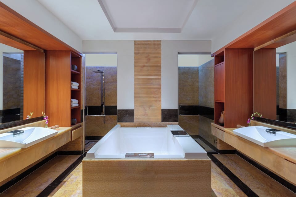 Presidential Suite, 2 Bedrooms | Bathroom | Separate tub and shower, deep soaking tub, rainfall showerhead